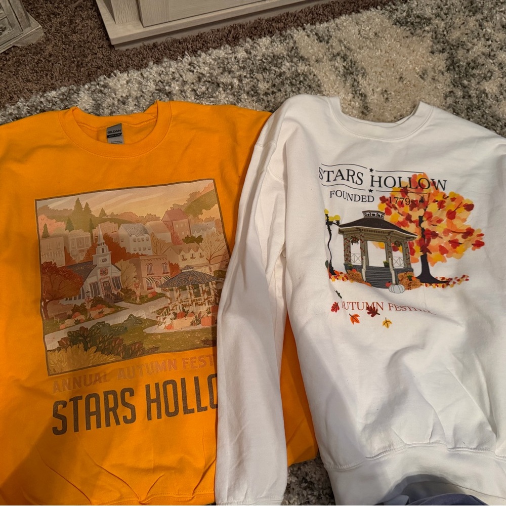 2 Gilmore Girls sweaters size Medium.